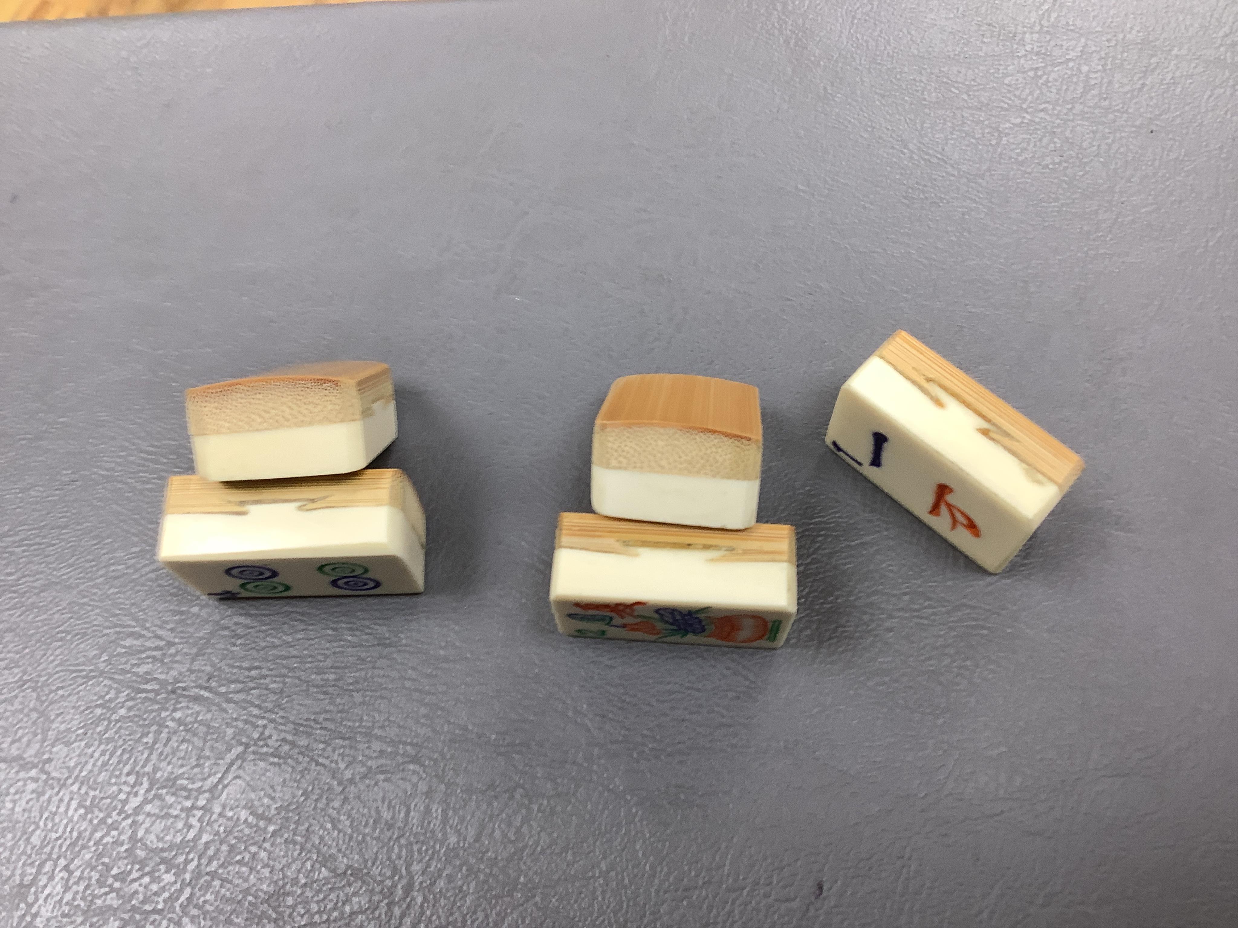 A Chinese carved boxed mahjong set and stands, box 24 cm high including handle